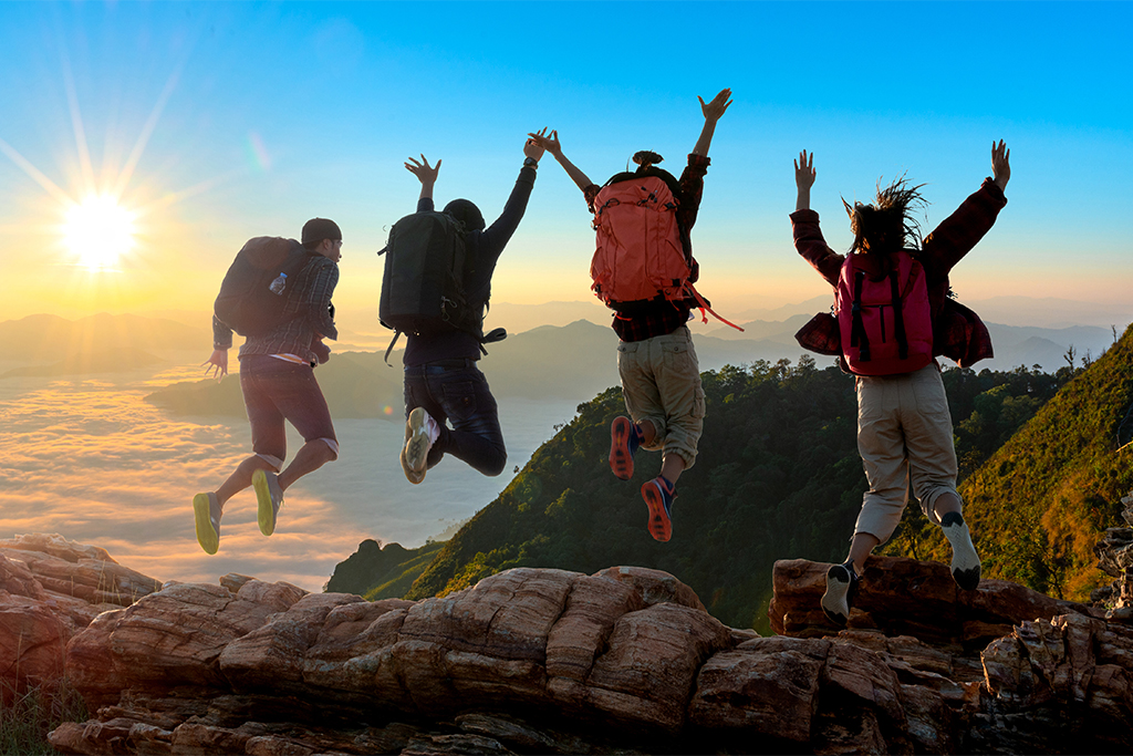 group of travelers enjoying kerala hills