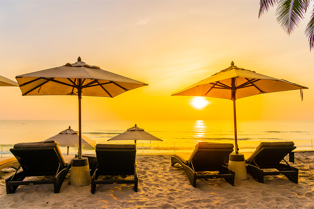 Beach with colorful umbrella and ocean view