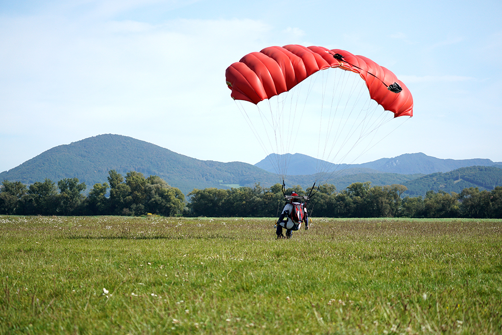 Tourist enjoying an exhilarating paragliding experience